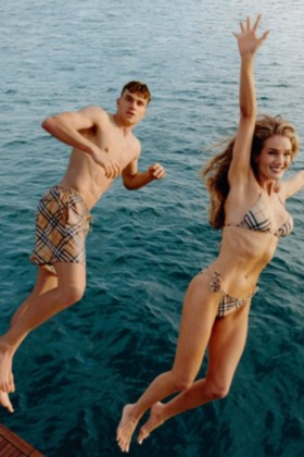 Model Rosie Huntington-Whiteley and Male Model wearing Burberry High Summer Collection