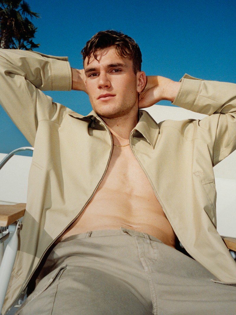 Model wearing Gabardine Chester Harrington Jacket in colour Flax