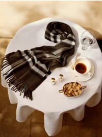 Burberry Checked Scarf on a table